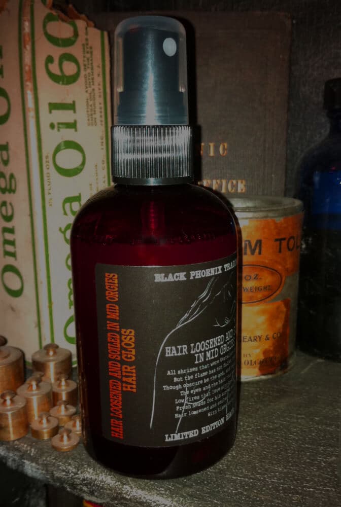 Hair Loosened & Soiled in Mid Orgies Hair Gloss Perfume Bottle
