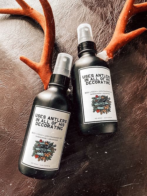Uses Antlers In All Of His Decorating Perfume Bottle